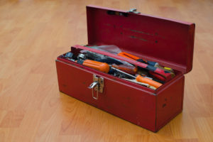 Red toolbox with tools